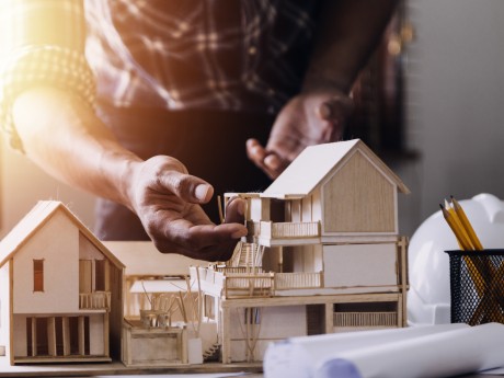 https://nl.vecteezy.com/foto/14000799-bouw-ingenieur-werken-bij-blauwdruk-naar-bouwen-groot-reclame-gebouwen-in-kantoor-bouwkunde-gereedschap-en-bouw-concept